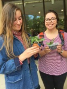 Image of students with plant starts